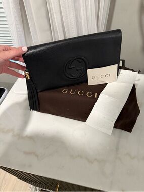 Gucci Black Leather Interlocking G Tassel Clutch